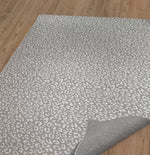 LEOPARD WHITE ON GREY Area Rug By Marina Gutierrez