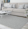 LEOPARD WHITE ON GREY Area Rug By Marina Gutierrez